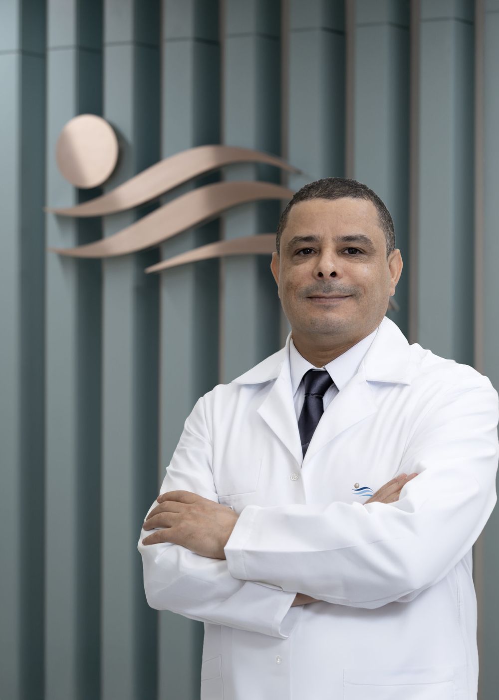 Dr. Abdelwahed Yahmadi, Consultant General Surgeon at The Pearl International Hospital, Doha